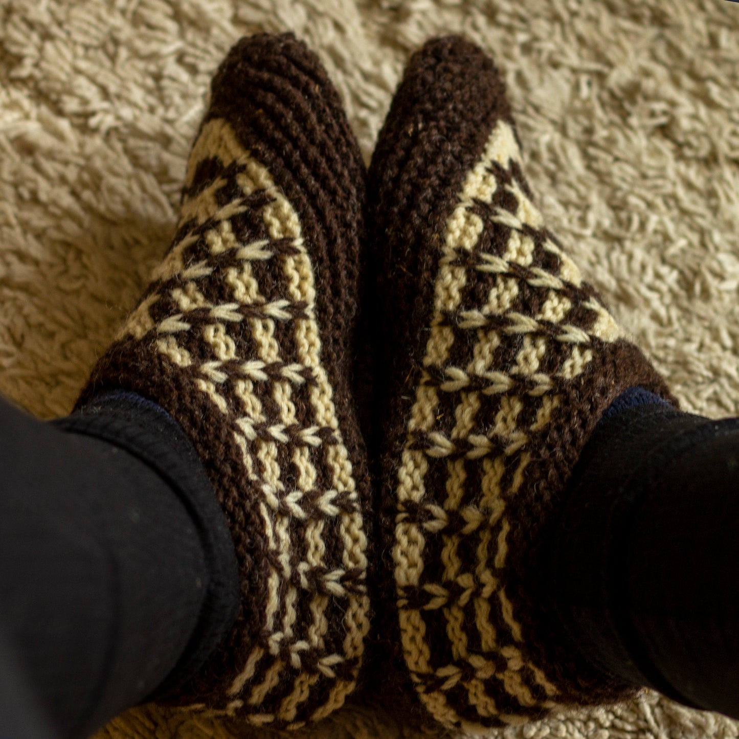 Knitted wool slipper showing on feet