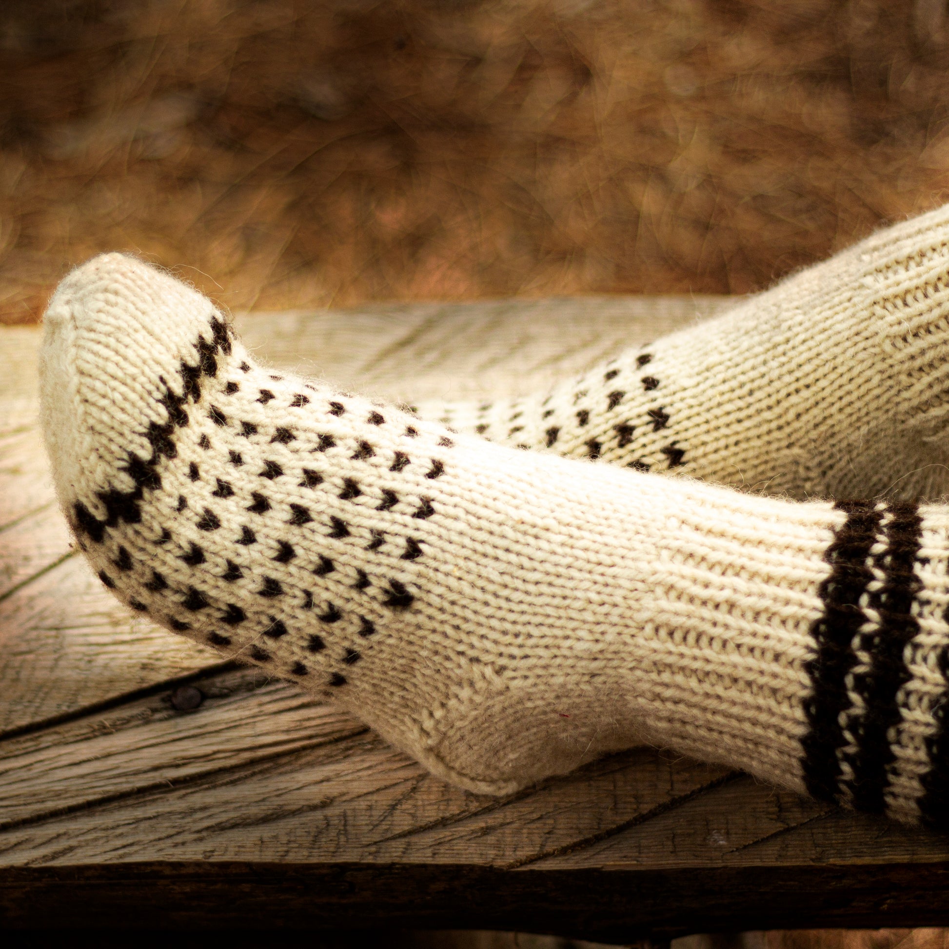 white wool socks with brown dots and brown stripes at the top